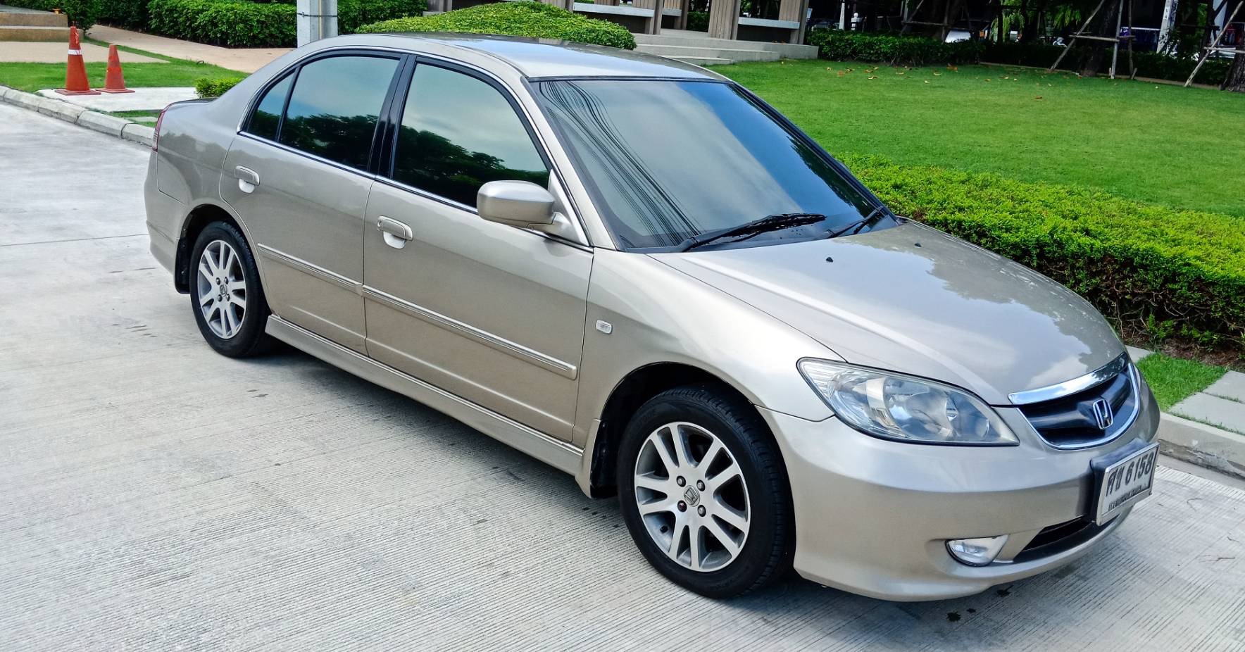 Honda Civic ES (Dimension) โฉม ตาเหยี่ยว ปี 2004 สีทอง