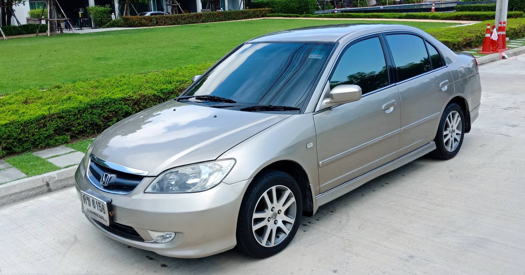 Honda Civic ES (Dimension) โฉม ตาเหยี่ยว ปี 2004 สีทอง (รูปที่ 8)