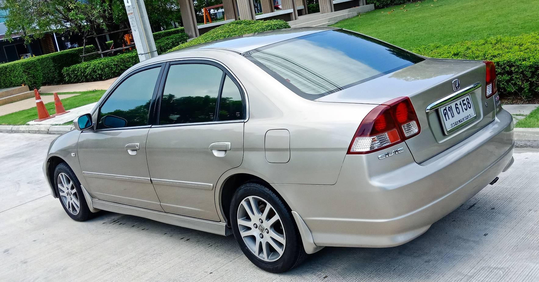 Honda Civic ES (Dimension) โฉม ตาเหยี่ยว ปี 2004 สีทอง (รูปที่ 3)