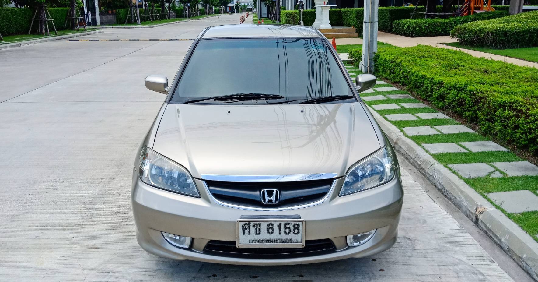 Honda Civic ES (Dimension) โฉม ตาเหยี่ยว ปี 2004 สีทอง (รูปที่ 2)