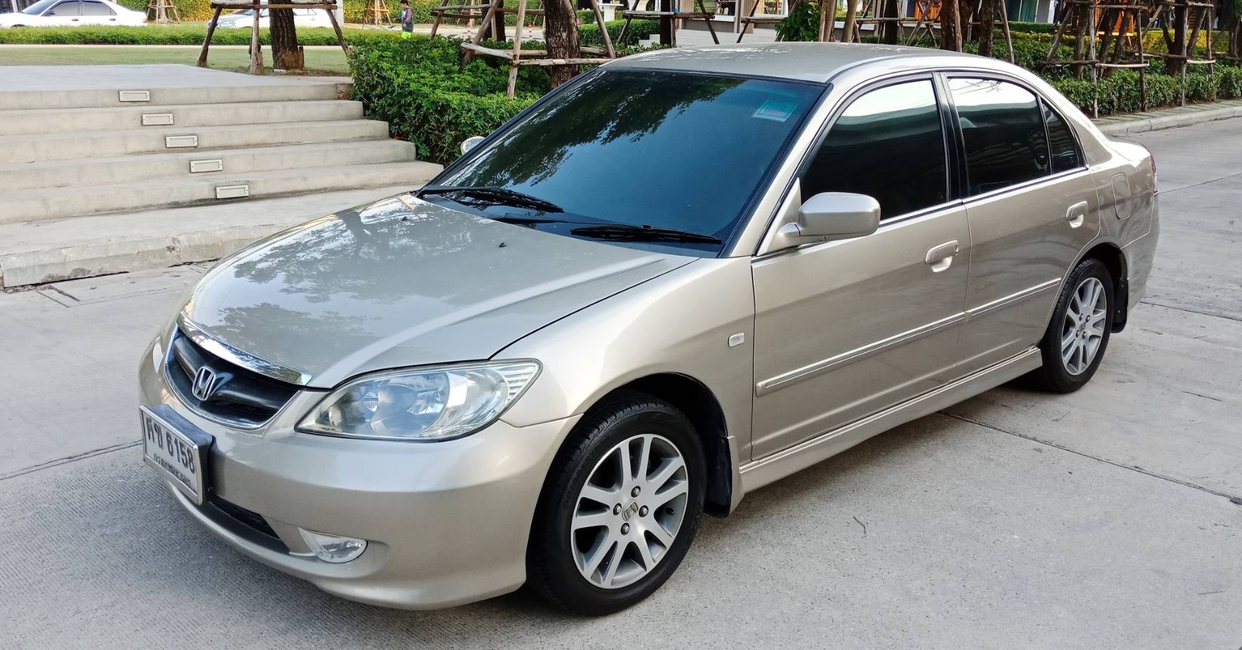 Honda Civic ES (Dimension) โฉม ตาเหยี่ยว ปี 2004 สีทอง