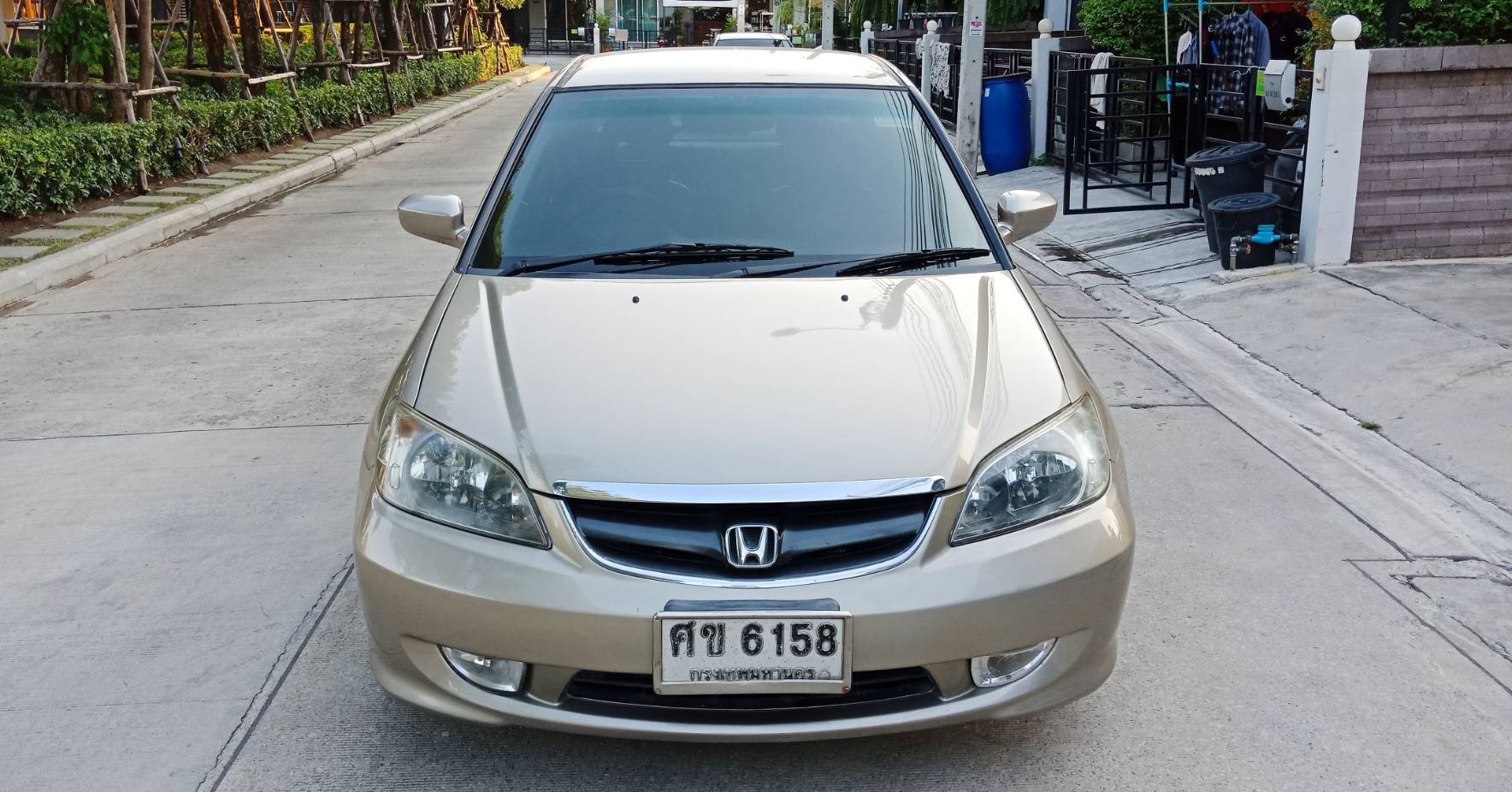 Honda Civic ES (Dimension) โฉม ตาเหยี่ยว ปี 2004 สีทอง (รูปที่ 2)