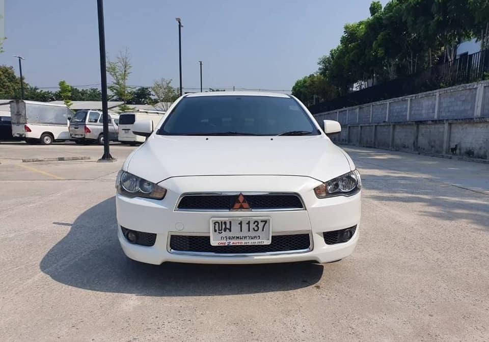 Mitsubishi Lancer EX ปี 2011 สีขาว (รูปที่ 12)