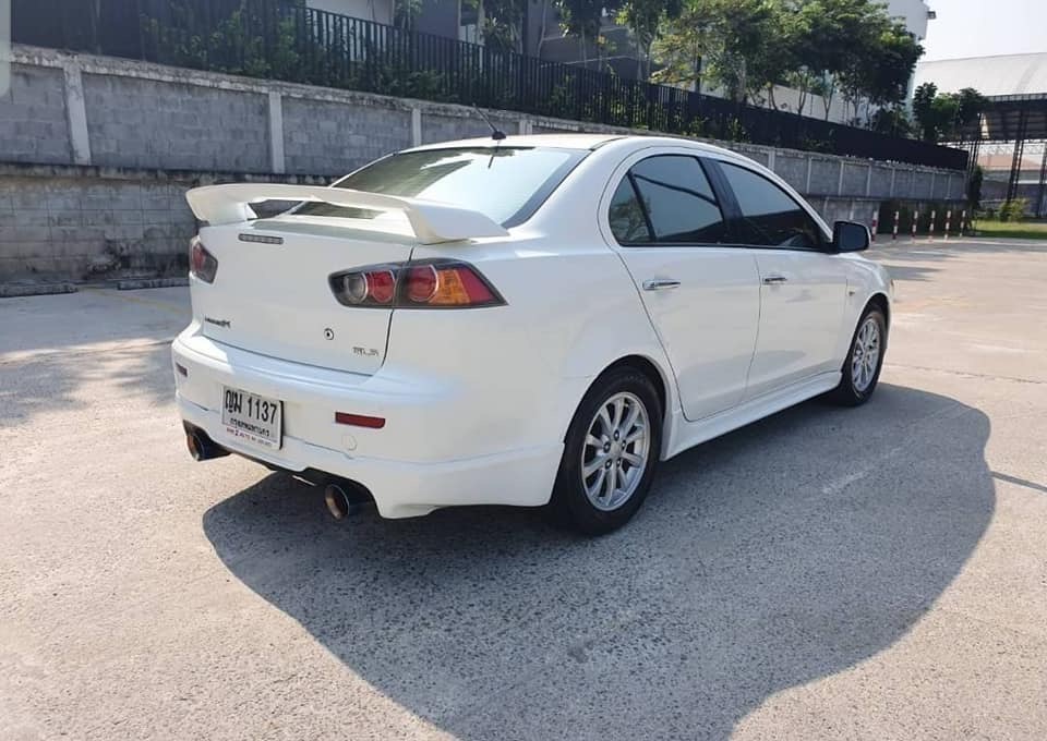 Mitsubishi Lancer EX ปี 2011 สีขาว (รูปที่ 2)