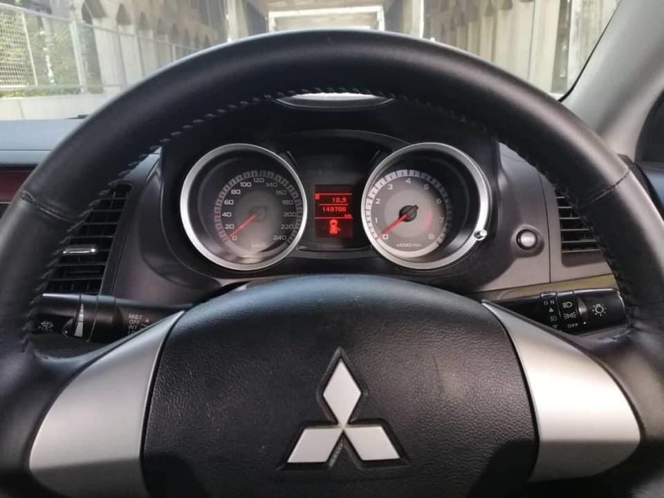 Mitsubishi Lancer EX ปี 2010 สีขาว (รูปที่ 10)