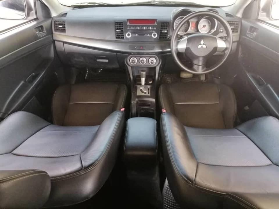 Mitsubishi Lancer EX ปี 2010 สีขาว (รูปที่ 9)
