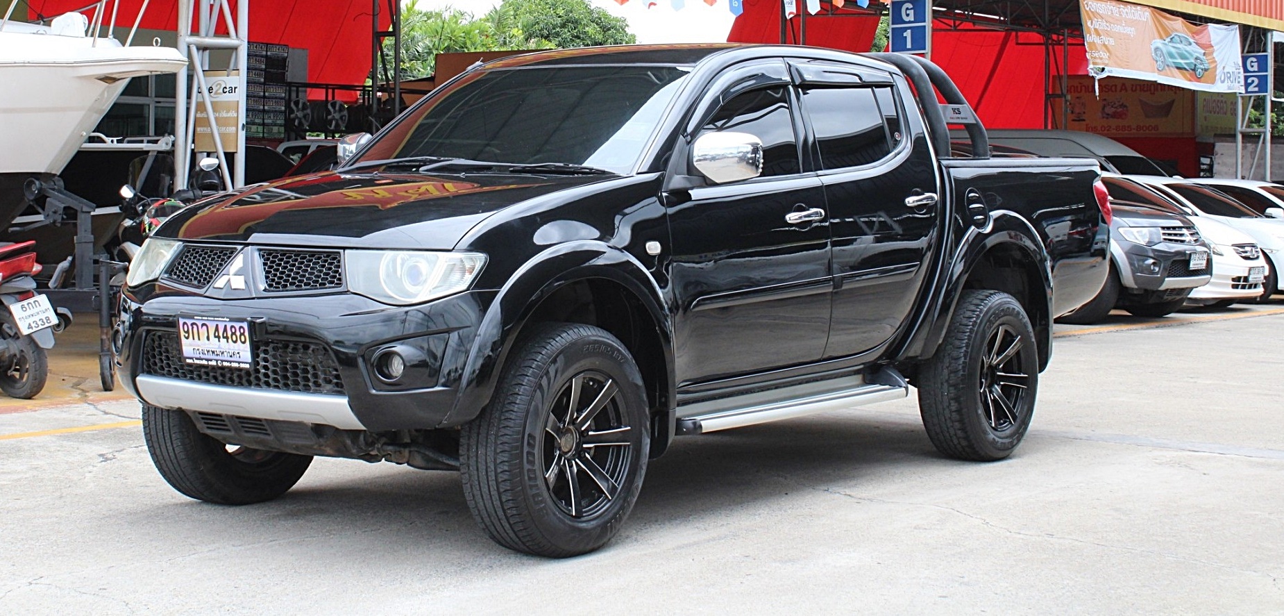 4x4 Mitsubishi Triton 2.5 DOUBLE CAB GLS 4WD AT สีดำ เกียร์ออโต้ 4ประตู