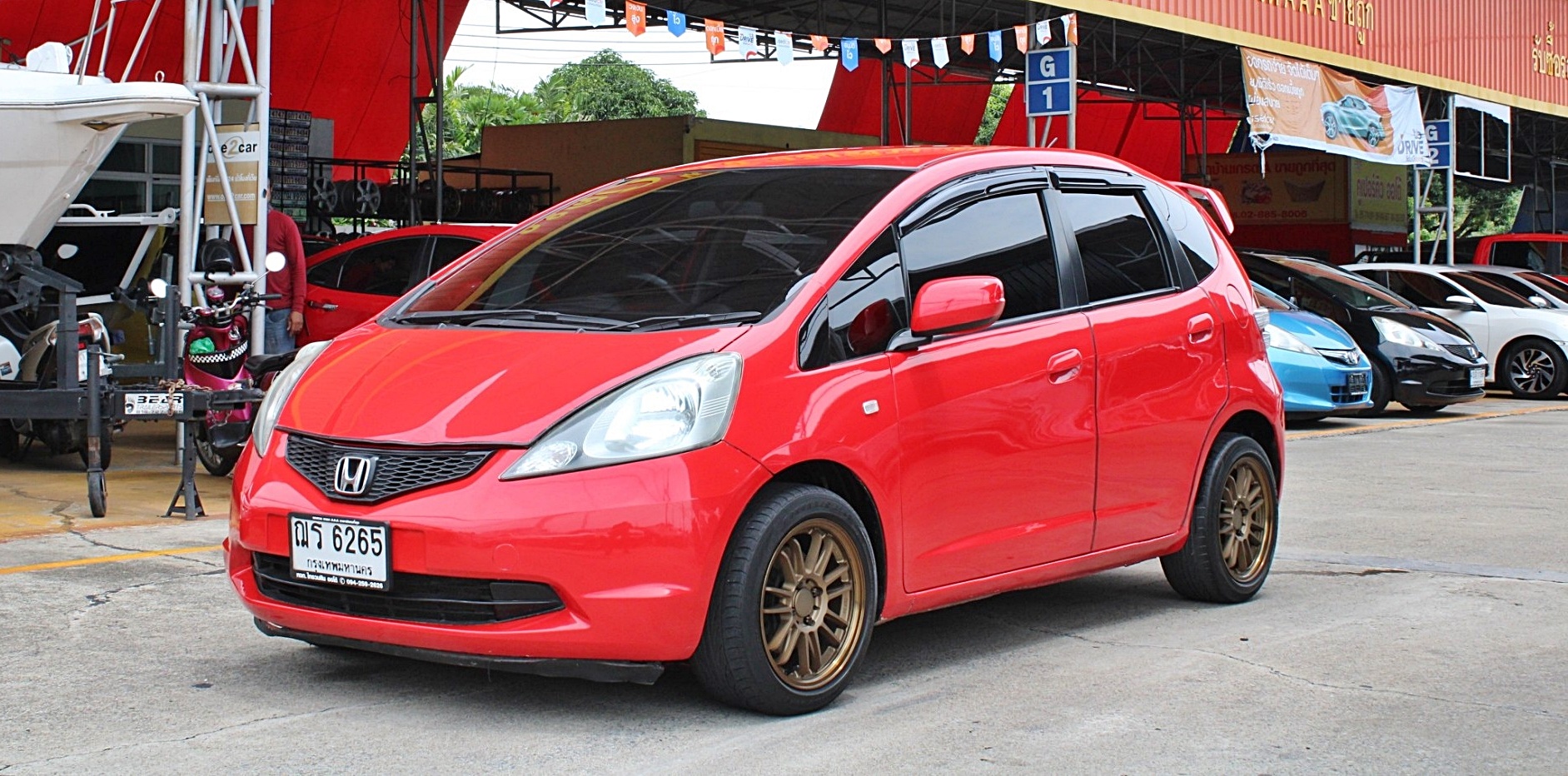 ผ่อน 4xxx 2009 Honda Jazz 1.5 V i-VTEC AT สีแดงนกแก้ว เกียร์ออโต้ ทรงดีสีใหม่ ไม่มีชนอุบัติเหตุหนัก ภายในเดิม เครื่องเดิมๆ