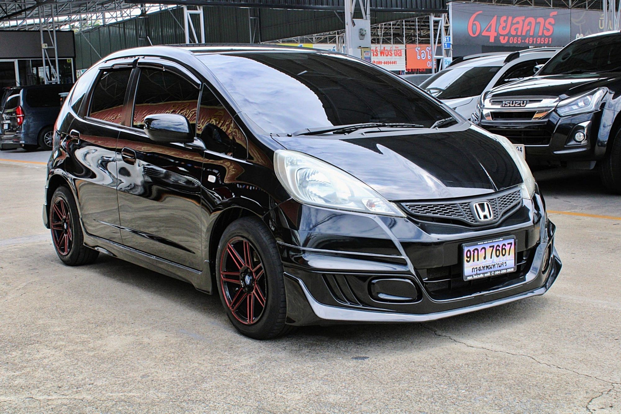2012 Honda Jazz GE 1.5 V i-VTEC Hatchback AT สีดำ เกียร์ออโต้ CVT เบาะหนัง ภายในดำ Airbag Abs ดิสเบรค4ล้อ ไม่มีอุบัติเหตุ บอดี้สวยครับ (รูปที่ 2)