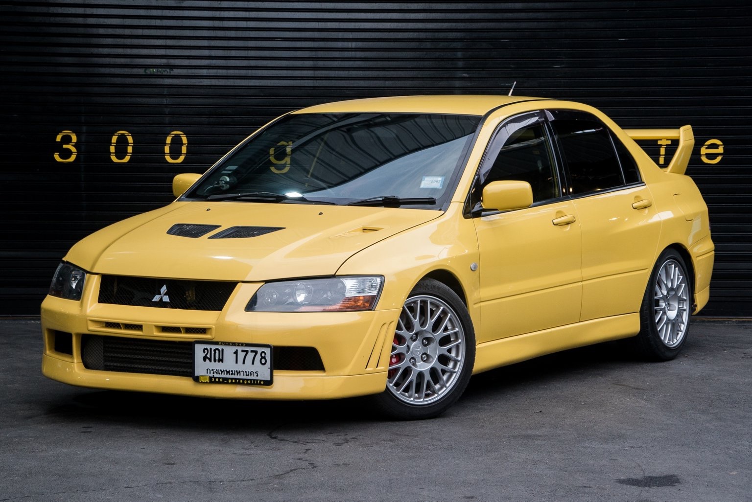 Mitsubishi Evolution VII ปี 2003 สีเหลือง