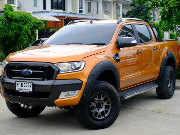 Ford ranger wildtrak 3.2 4WD เครื่องยนต์: ดีเซล เกียร์ ออโต้ ปี2016 สีส้ม ไมล์ 67,xxx km.