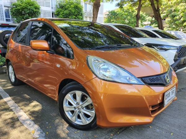Honda Jazz 1.5V(AS) ออโต้ สีส้ม ปี 2012